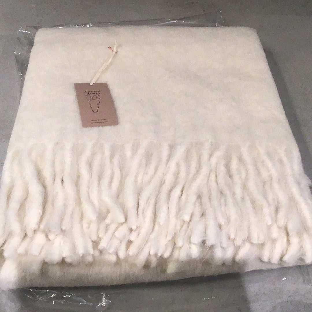 Dove and Donkey cream woolly mammoth throw blanket